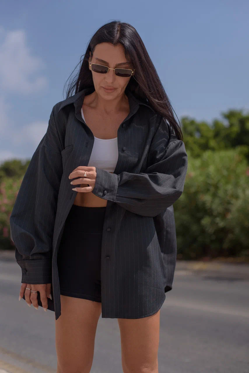 Front view of an oversized pinstripe blazer shirt.